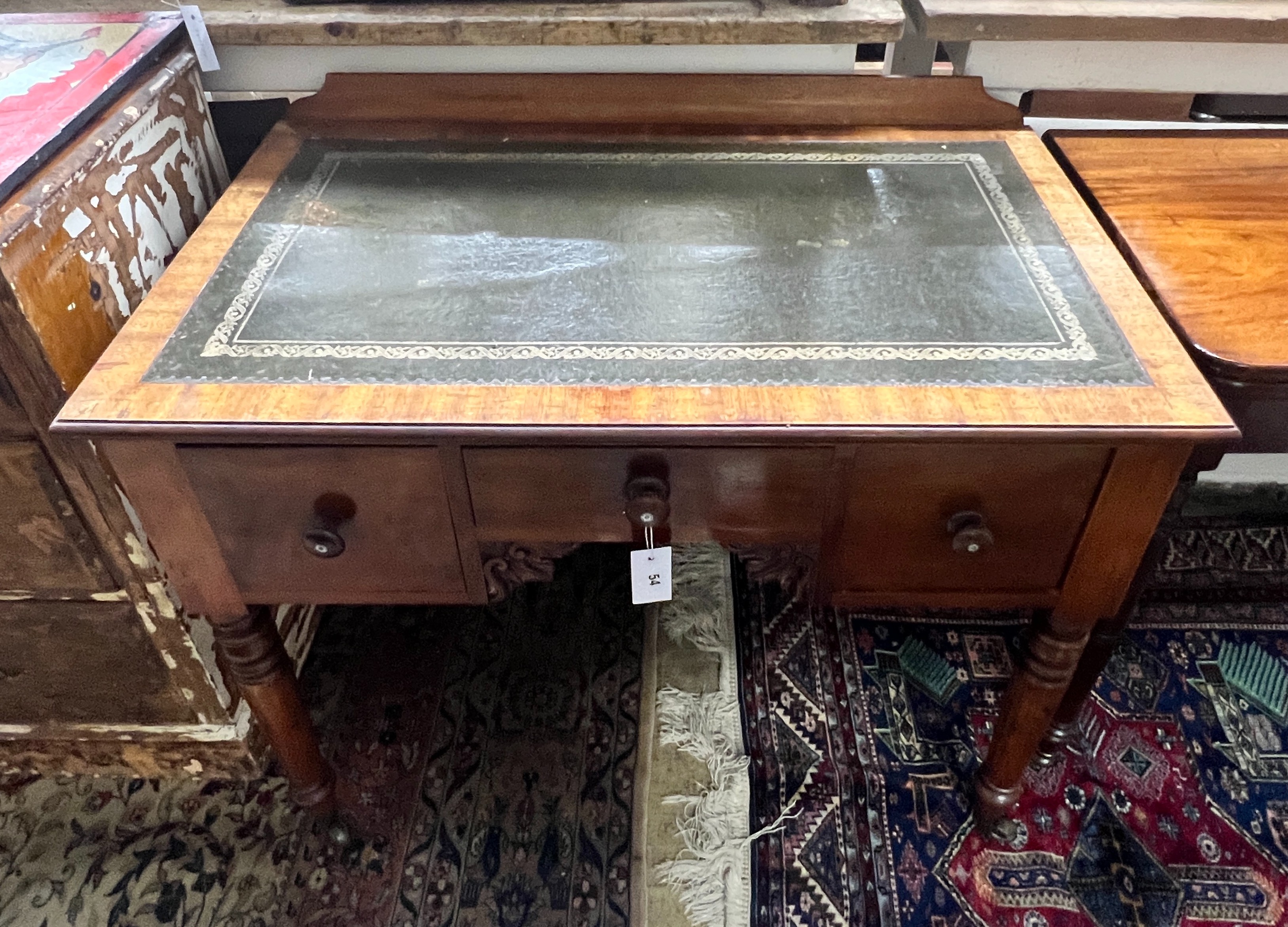 An early Victorian mahogany kneehole writing table, width 91cm, depth 53cm, height 75cm